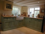 A newly built kitchen hand painted and distressed